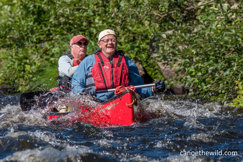 Chase Stream Rapids on The Allagash, the bow paddler's expressions suggest he is having a great time while his stern partner tells a different story! Camera and settings: Nikon D500 using a Nikon lens 80-400mm, shutter speed 1600, 370mm, F stop 7.1, ISO 9