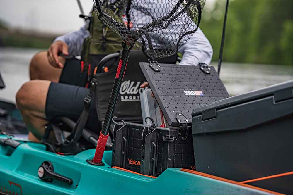 Close up image of a tackle crate in a sit on top fishing kayak