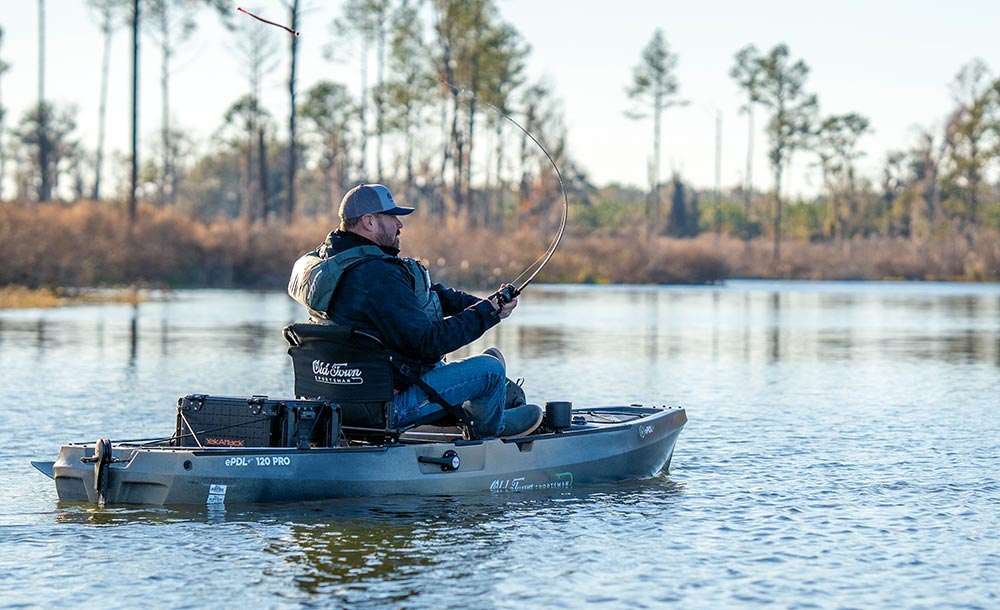 Man fishing in the Old Town ePDL+ 120 PRO fishing kayak