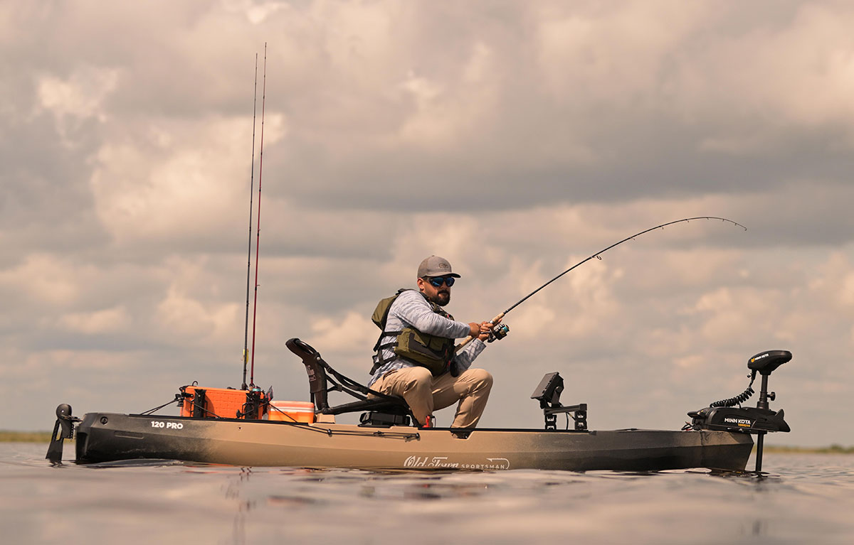 Man fishing from Old Town Sportsman 120 PRO fishing kayak
