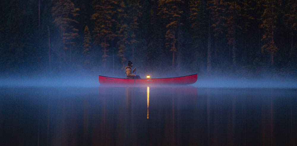 In old Town Discovery Canoe with lantern