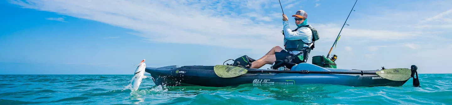 Man fishing in the Old Town Sportsman BigWater ePDL+ 132 fishing kayak