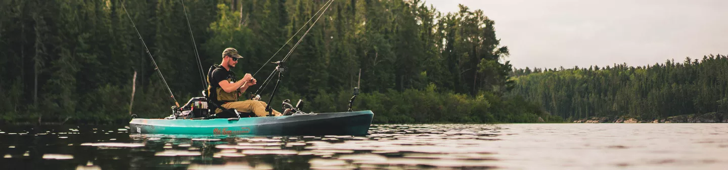 A kayak angler on an Old Town fishing kayak.