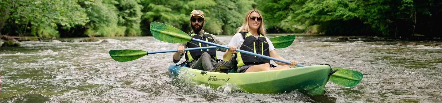 Two people paddling in the Old Town Ocean Kayak Malibu Two kayak