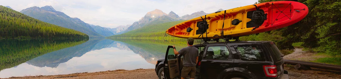 Old Town Ocean Kayak on top of car with Malone Car & Truck Kayak Carrier