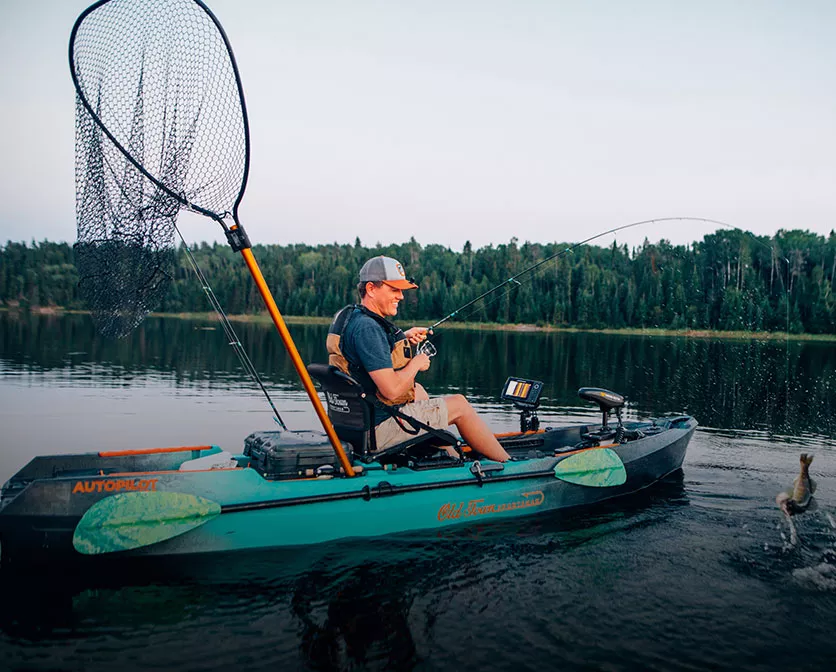 Man fishing in Old Town Sportsman AutoPilot fishing kayak