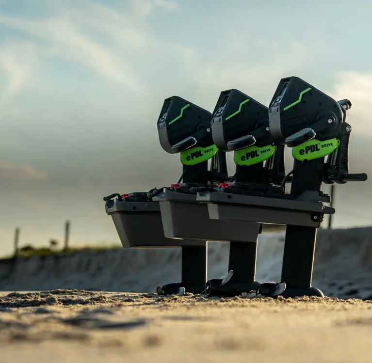 Lineup of Old Town ePDL+ retroFit console drives on a beach